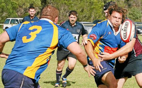 Gympie Hammers player Dan Luva offloads to Scott Finlay during a pre-season trial match away against the Fraser Coast Mariners at the weekend. The Hammers won 29-20, fuelling hopes the side will carry more clout this season after finishing with the wooden spoon last year. Gympie Hammers player Dan Luva offloads to Scott Finlay during a pre-season trial match away against the Fraser Coast Mariners at the weekend. The Hammers won 29-20, fuelling hopes the side will carry more clout this season after finishing with the wooden spoon last year.